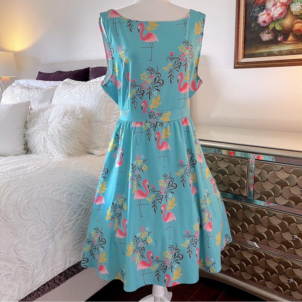 Flamingo print 1950s retro style dress. Size 3XL. Teal green with pink flamingos